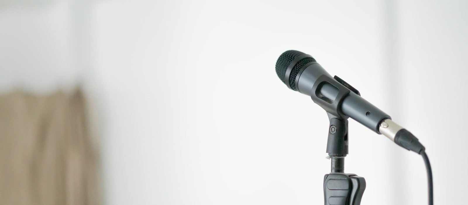black and gray microphone on white background